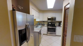 Unit 114 - Enjoy the walk-out balcony and FREE BEACH SERVICE